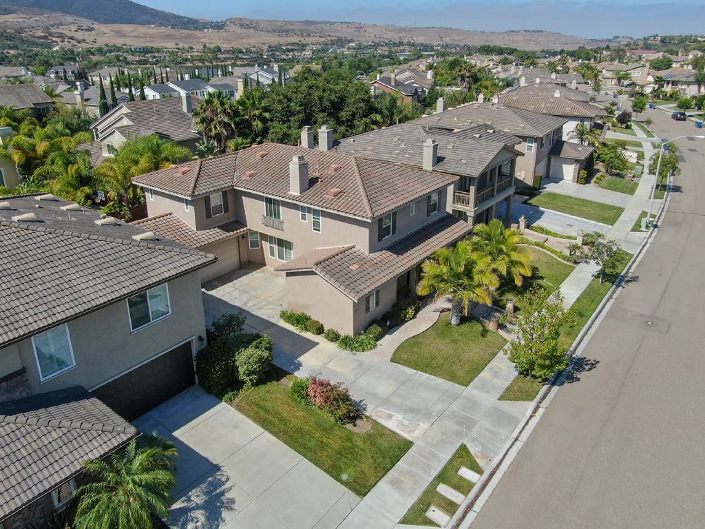 Aerial View of San Diego Canyon Side Neighborhood with Modern Spanish Revival Homes.jpg