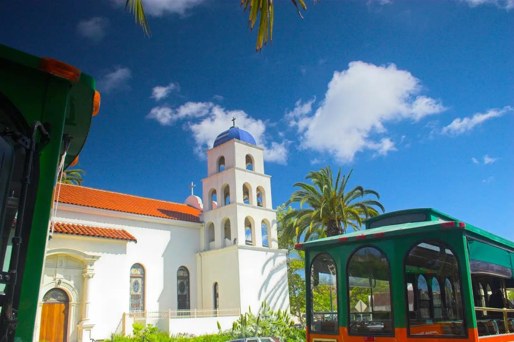 San Diego Old Town Mission San Diego de Alcala with Green Sightseeing Trolley.jpg